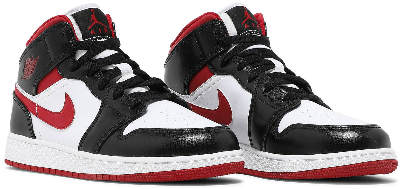 Nike air jordan 1 mid all black hotsell
